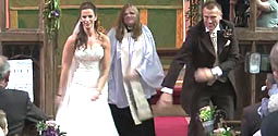 Gary and Tracy Richardson had just shared their first kiss as husband and wife when the song "Everybody Dance Now" suddenly blasted through the speakers.